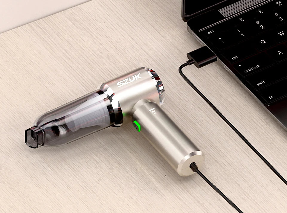 Silver SZUK tool connected to a laptop