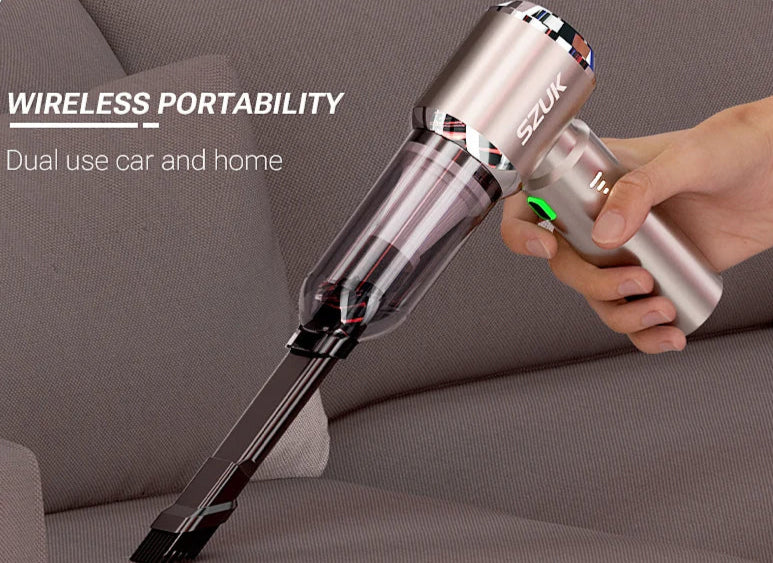 Handheld vacuum cleaner with 'Suzuk' branding on a gray couch, emphasizing wireless portability.